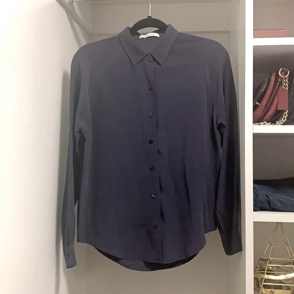 Navy Everlane silk shirt.